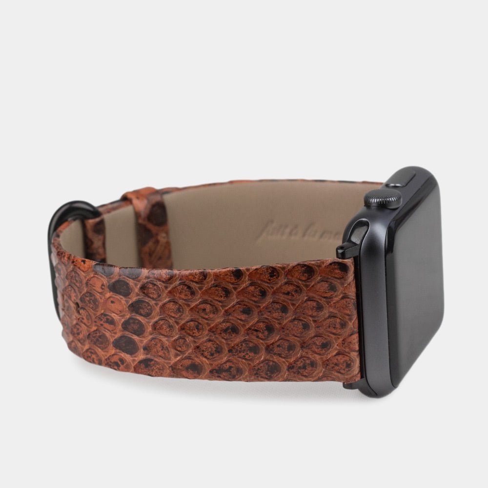 gold  python strap apple watch with black adapters and buckle side view