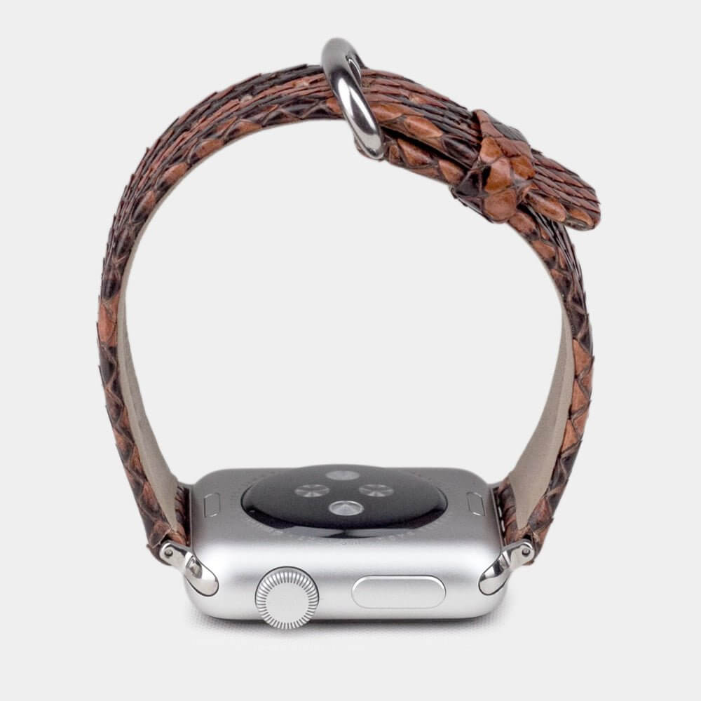 Strap for the Apple Watch 41/42 mm in Gold python leather, with steel adapters and buckle | watch case on bottom to see leather texture, inner lining and the buckle