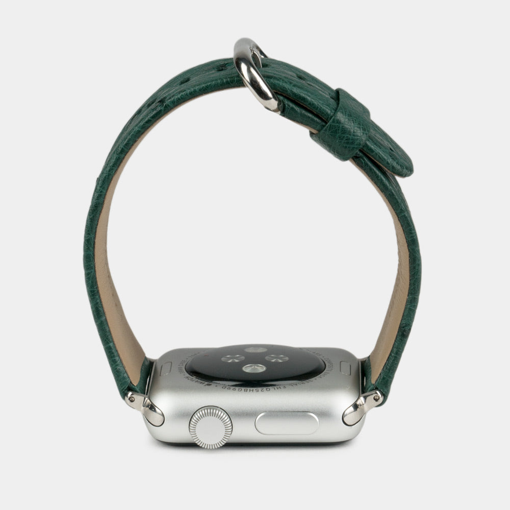 green ostrich strap apple watch with steel adapters and buckle profile view