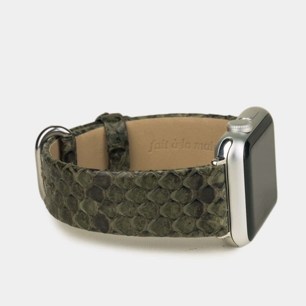 Strap for the Apple Watch 41/42 mm in green python leather, with steel adapters and buckle | close-up on the inner lining leather and the brand stamp