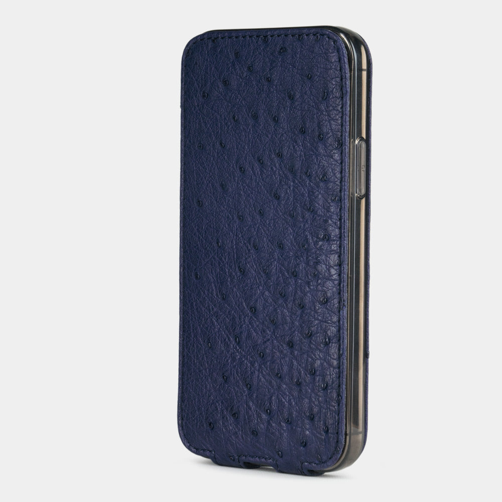 blue ostrich leather iphone 12 pro max flip case in an upright position, cover closes securely thanks to its integrated magnet system