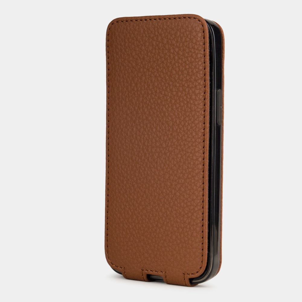 gold leather iphone 12 mini flip case in an upright position, cover closes securely thanks to its integrated magnet system