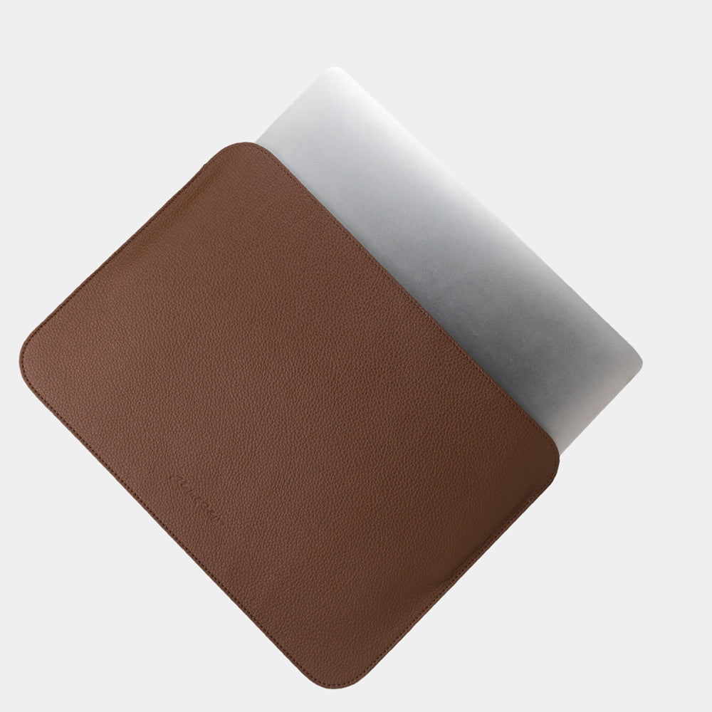 Brown leather laptop sleeve 14 inch detail showing opening and soft interior lining