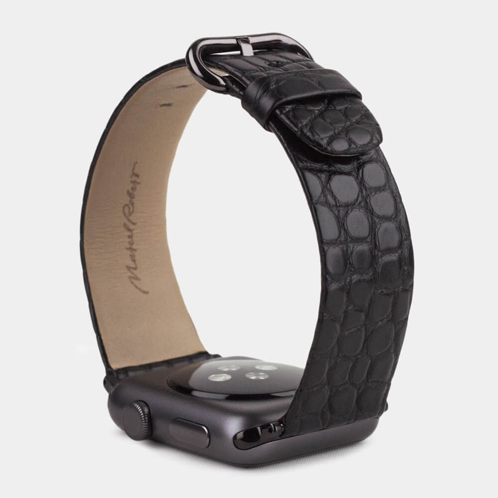 Strap for the Apple Watch 45/46 mm in black matte alligator leather, with black adapters and buckle | 3/4 profile view to see the inner lining leather