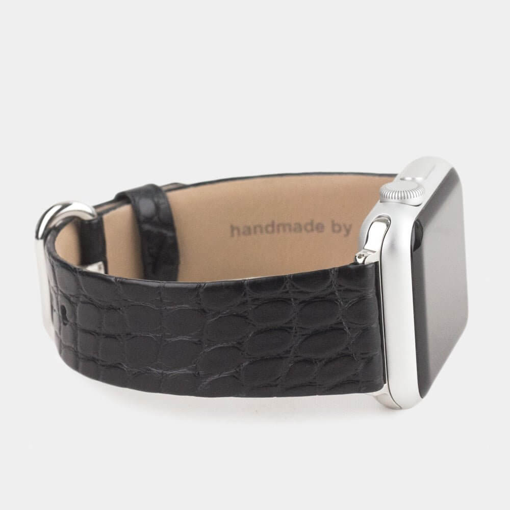 Strap for the Apple Watch 45/46 mm in black matte alligator leather, with steel adapters and buckle | 3/4 profile view to see the inner lining leather