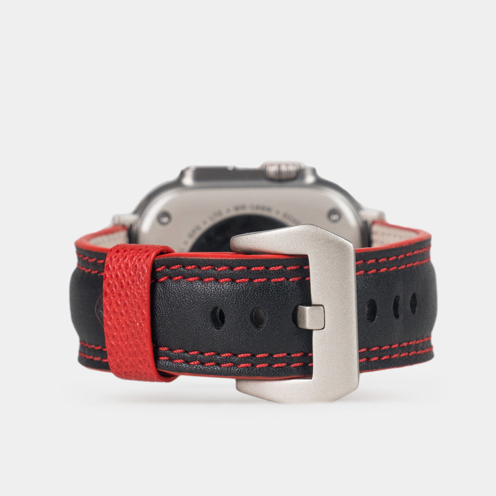 Men's Apple Watch Ultra band 49mm in black smooth calfskin leather with red edge finish and its titanium color adapters - main view