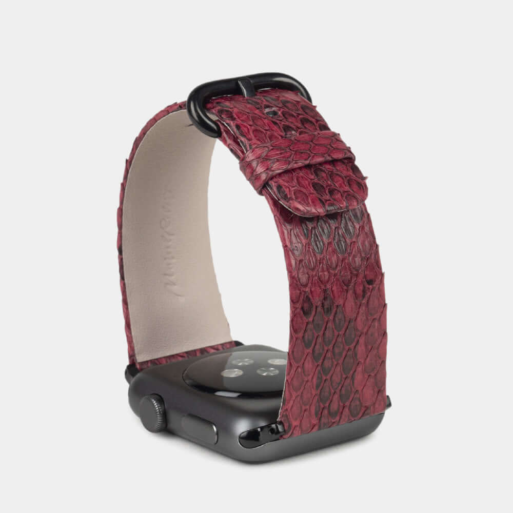 Strap for the Apple Watch 41/42 mm in bordeaux python leather, with black adapters and buckle | full profile view to see the thickness of the strap