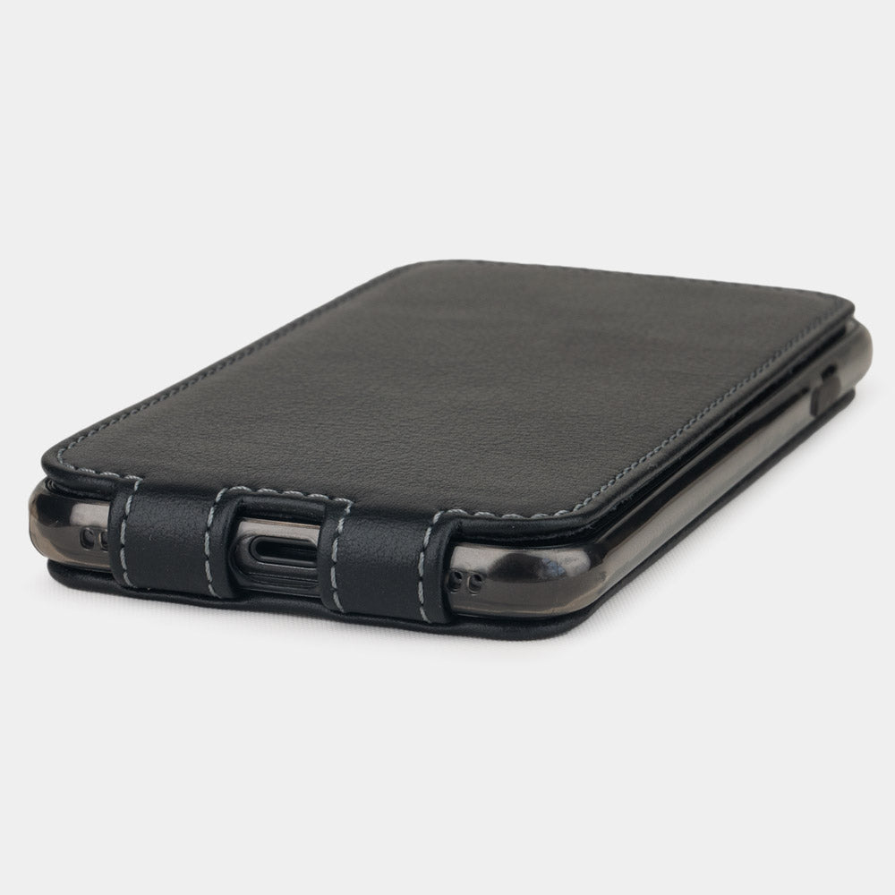 Black leather flip case for iPhone SE - view from camera side and how the lenses are efficiently protected