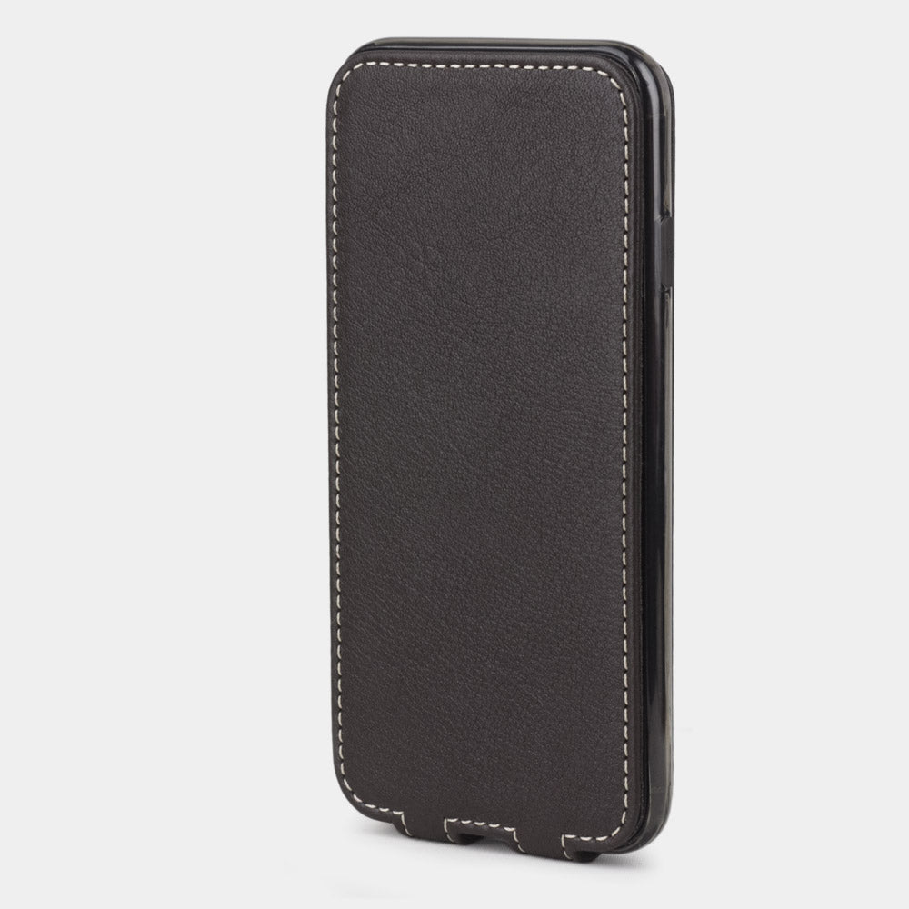 Brown leather flip case for iPhone SE - upright closed view highlighting the magnetic front cover fully protecting the screen, elegant silhouette