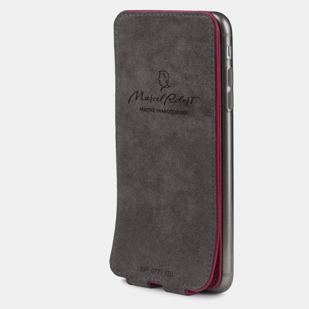 Fuchsia leather flip case for iPhone SE - interior view showing grey Alcantara lining with magnetic closure, designed to clean and protect the screen