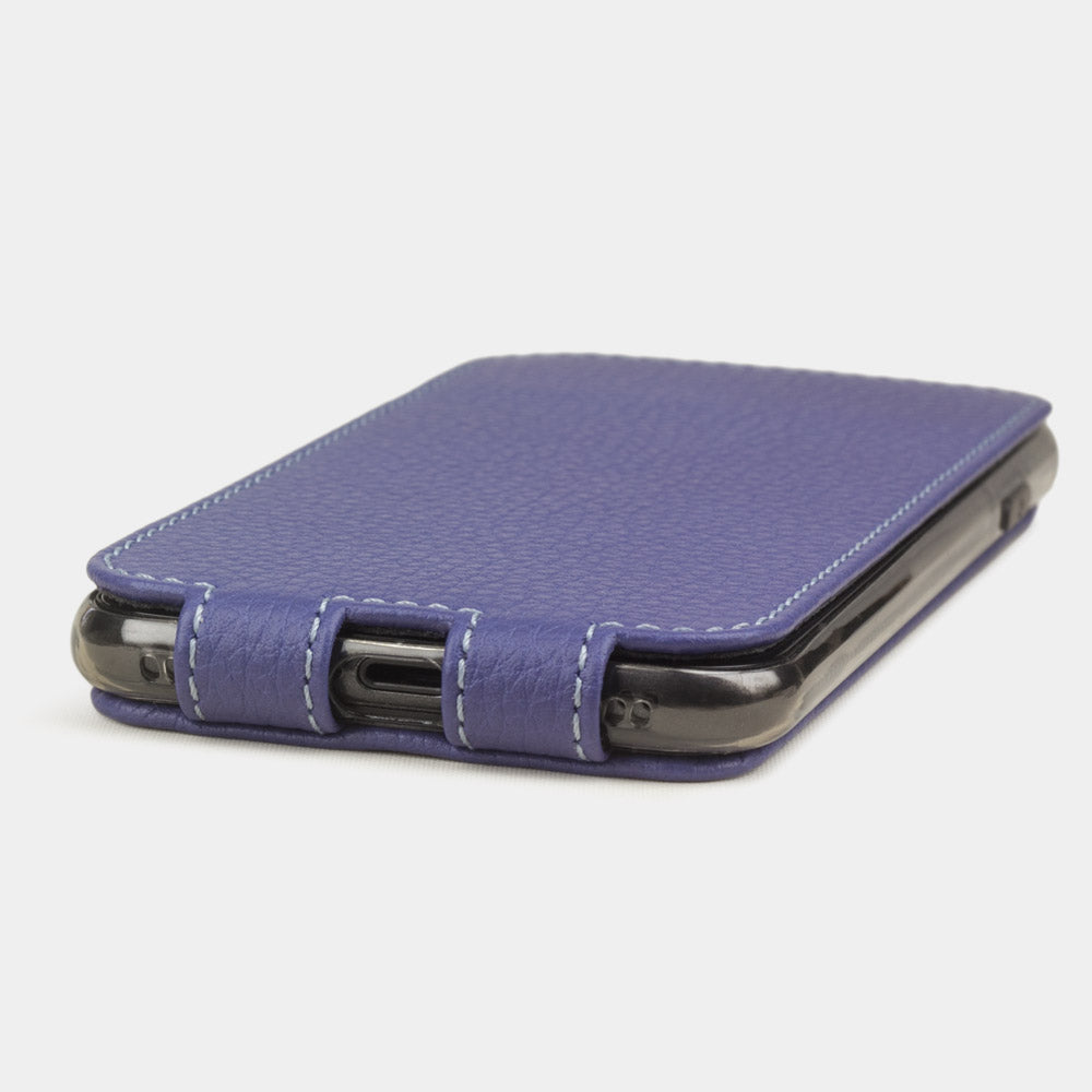 Purple leather flip case for iPhone SE - flat side view displaying ultra-thin handcrafted design, Lightning port opening and precise edge finishing