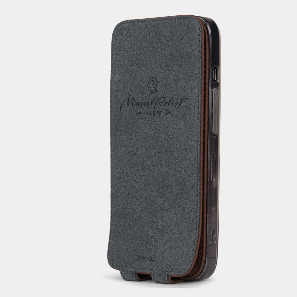 iPhone 14 Pro flip case made with brown premium leather – flap folded onto the back of the iPhone, showing the Alcantara® fabric lining that cleans the screen
