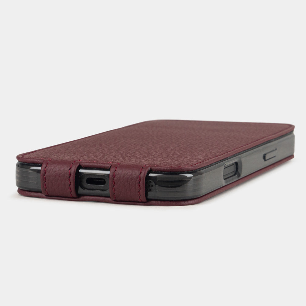 bordeaux leather flip case iPhone 17 - flat side view displaying ultra-thin handcrafted design, USB-C port opening and precise edge finishing