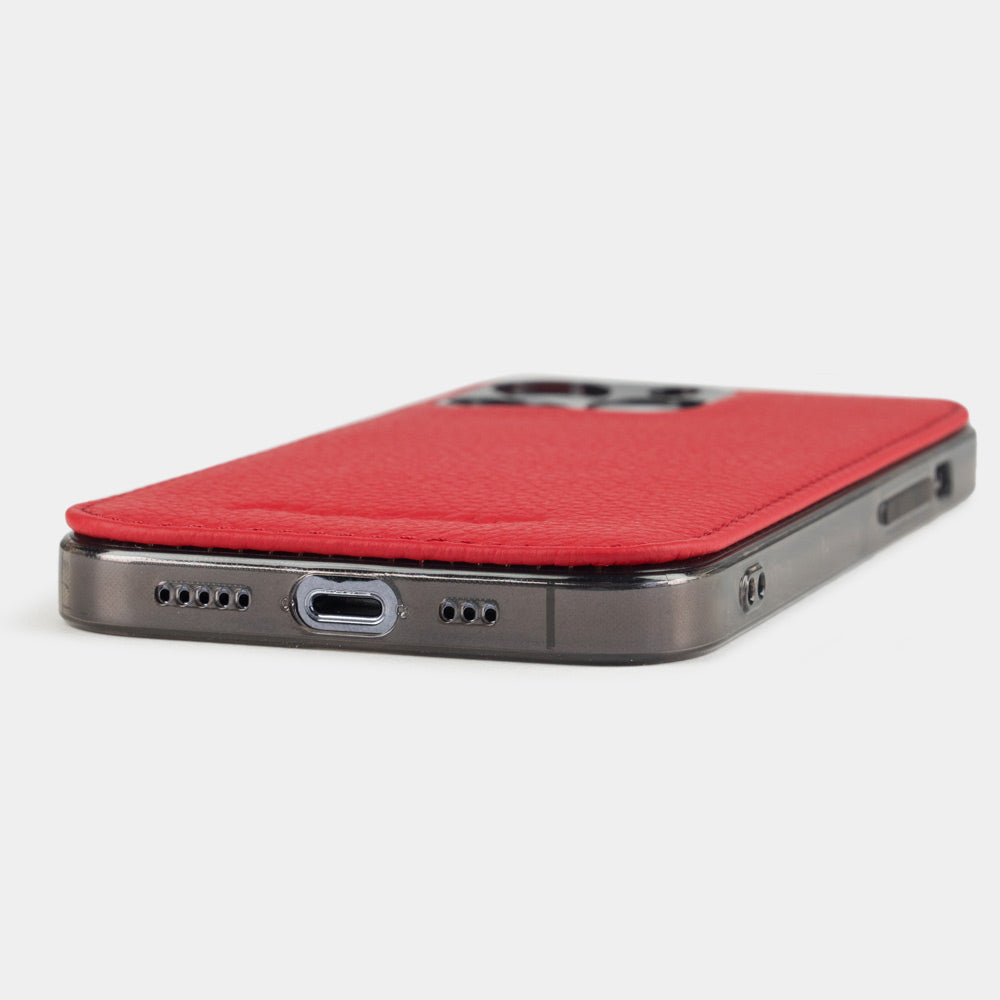 red leather Cover Case iPhone 15 Pro Max - flat side view displaying ultra-thin handcrafted design, USB-C port opening and precise edge finishing