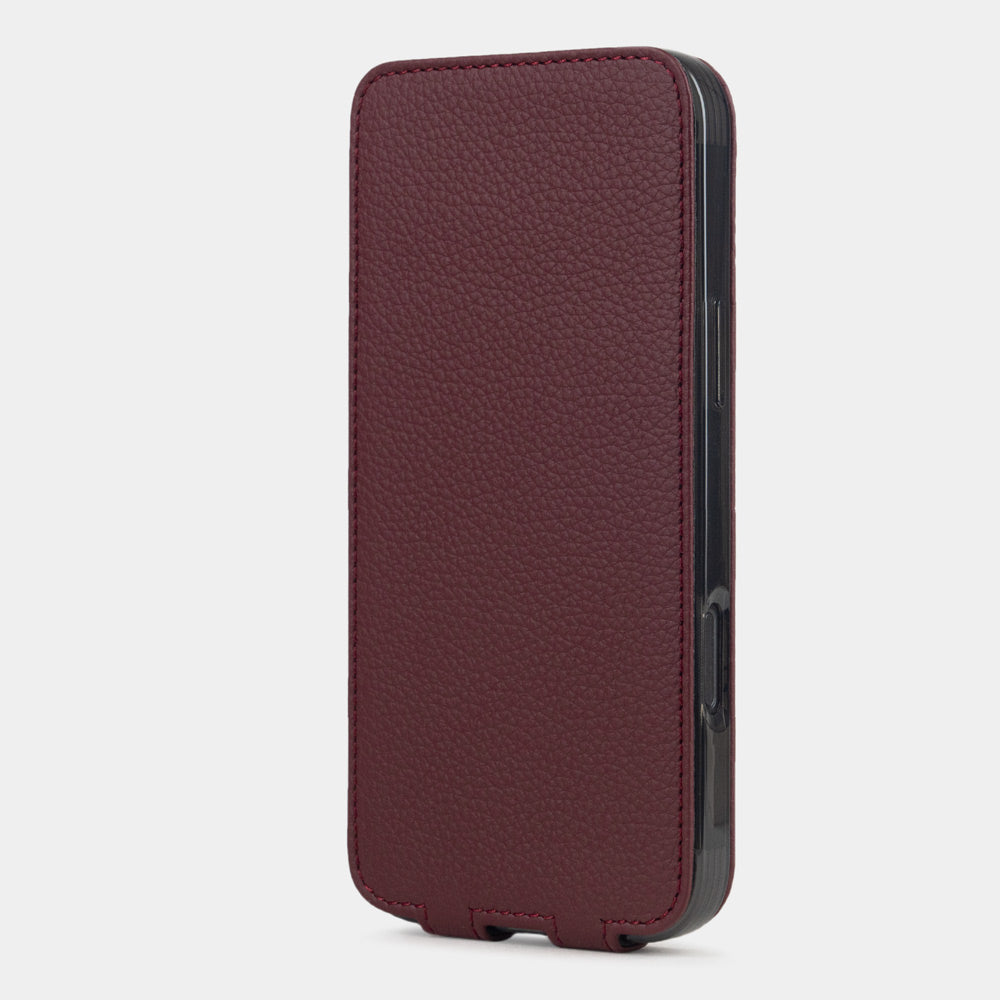 Bordeaux leather flip case iPhone 17 – upright closed view highlighting the magnetic front cover fully protecting the screen, elegant silhouette