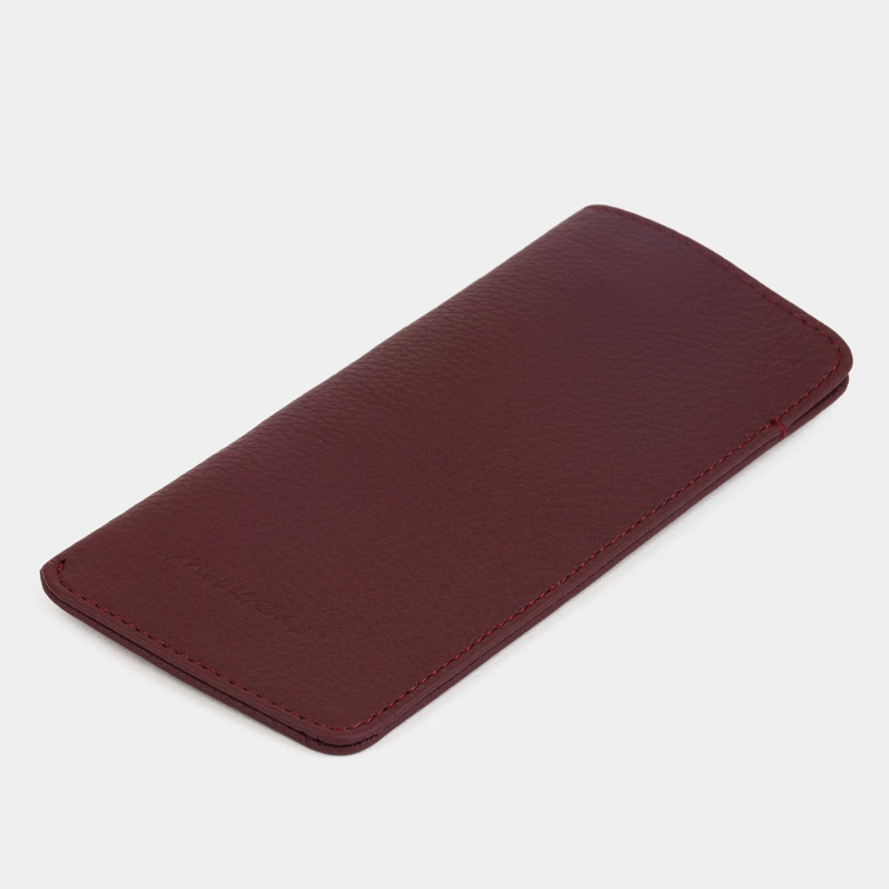 Bordeaux calfskin Pocket glasses pouch lying flat, three-quarter view