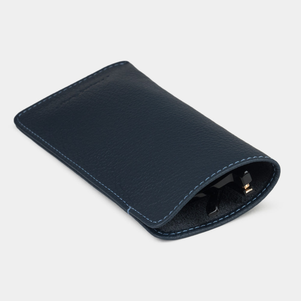 Blue calfskin Pocket glasses pouch seen from the side, glasses inside