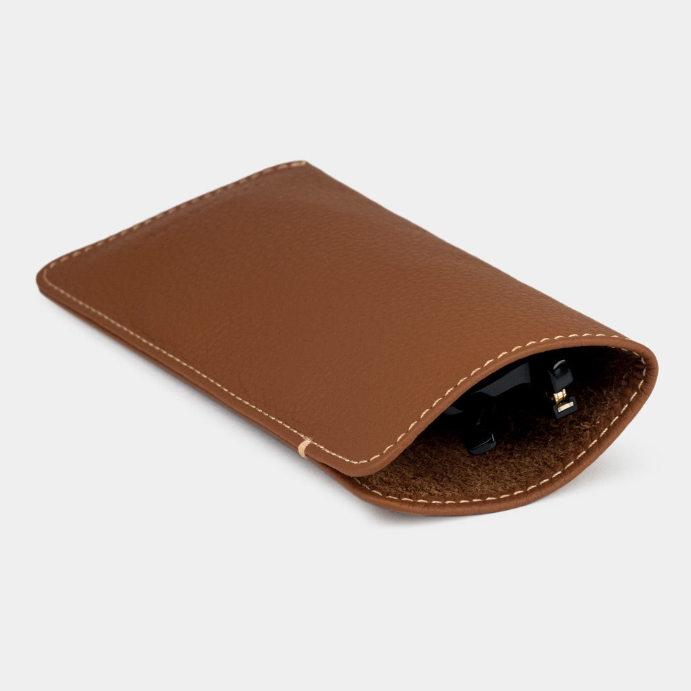 Gold calfskin Pocket glasses pouch seen from the side, glasses inside