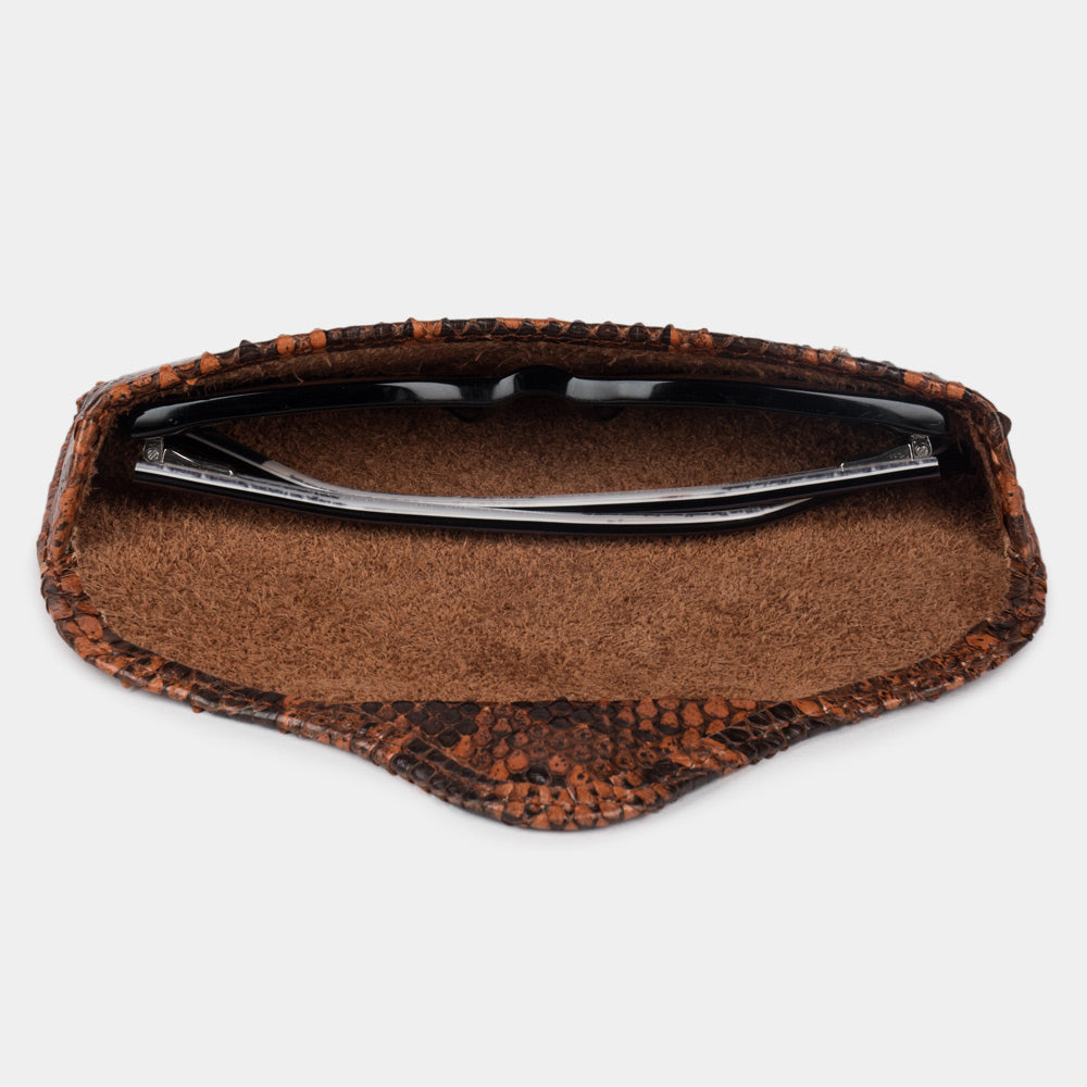 Gold python leather Casual case seen from above, glasses resting on the suede