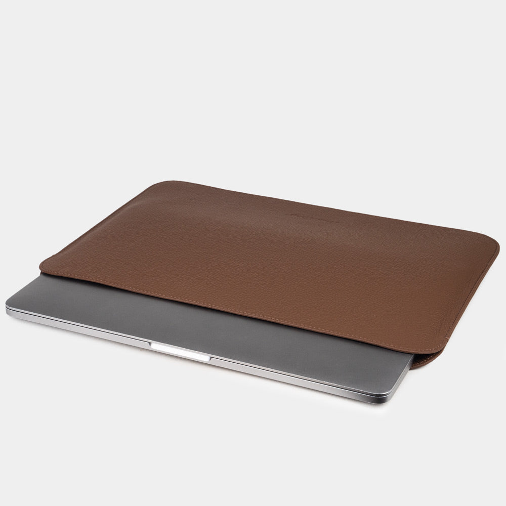 Leather laptop sleeve for MacBook Air 15 inch, brown – back view, plain leather panel with no closure