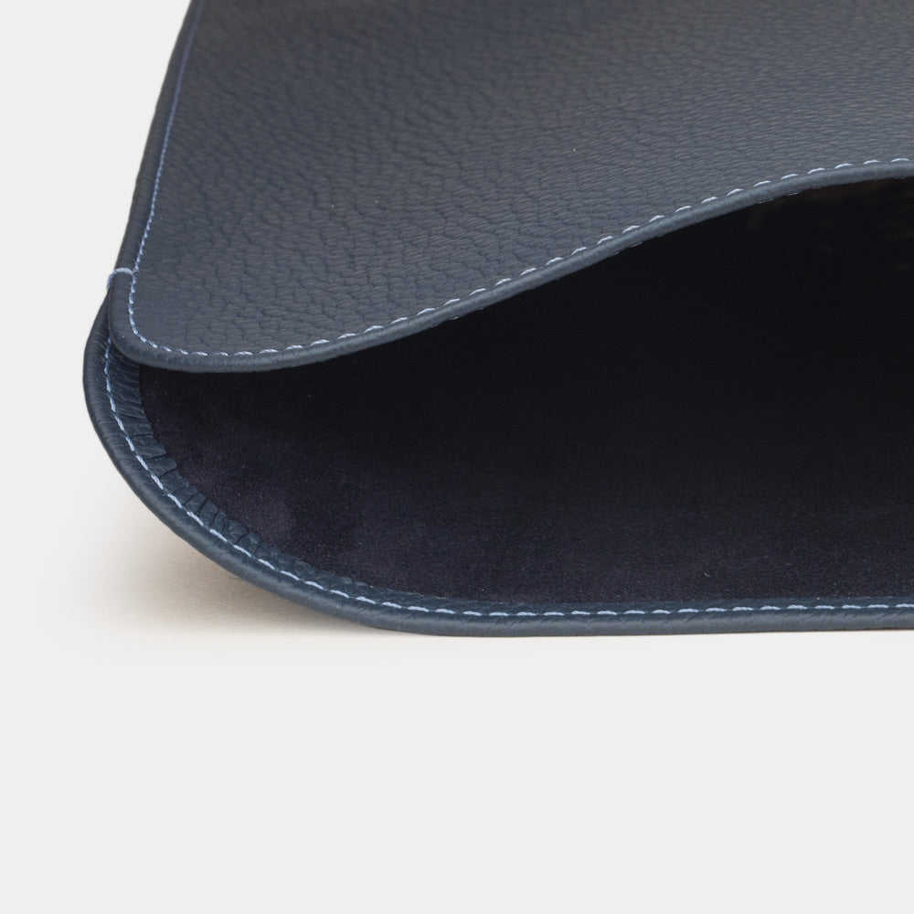 Blue leather laptop sleeve 14 inch detail showing curved opening and soft interior lining