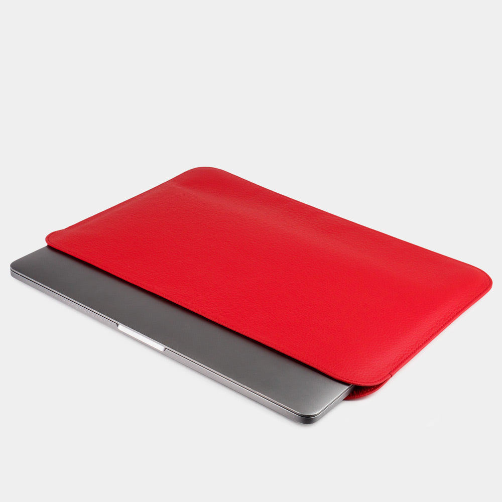 Slim red leather laptop sleeve 14 inch holding MacBook, minimalist protective MacBook case