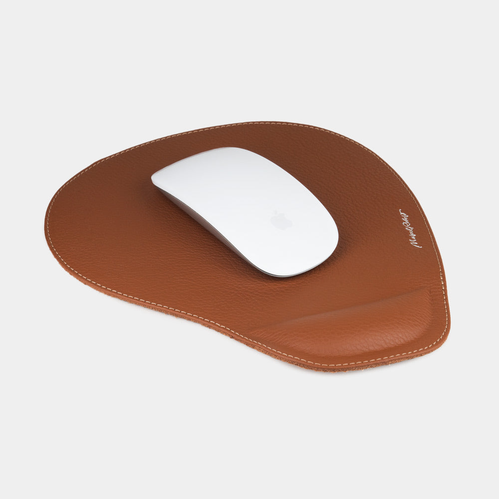 Gold leather mouse pad with wrist rest, white mouse on grained calfskin