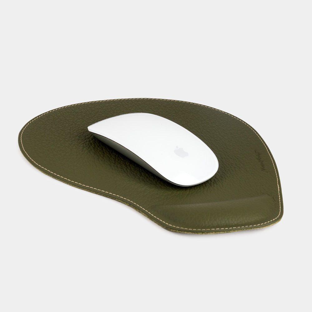 Green leather mouse pad with wrist rest, white mouse on grained calfskin