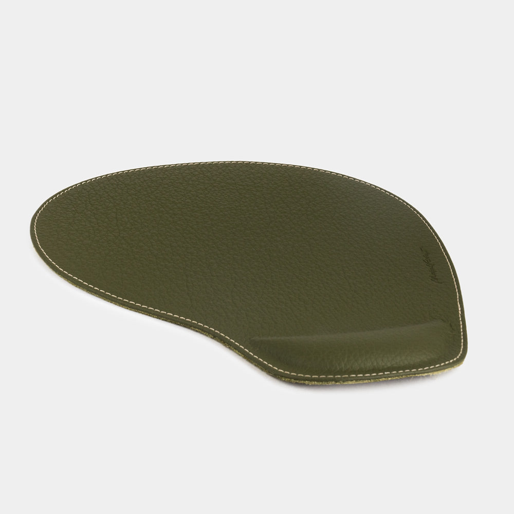 Green leather mouse pad, side view of the padded wrist rest and stitched edge