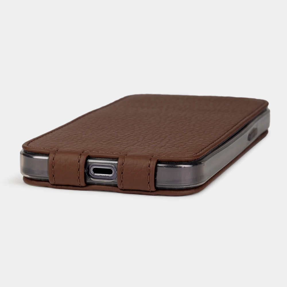 iPhone 14 Pro Max flip case made with brown premium leather – the case laid flat, showing the precise charging-port cut-out and how slim it stays