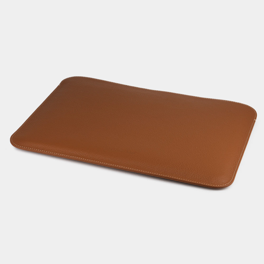 Leather laptop sleeve for a 13 inch MacBook, gold – the empty sleeve laid flat, showing how slim it stays