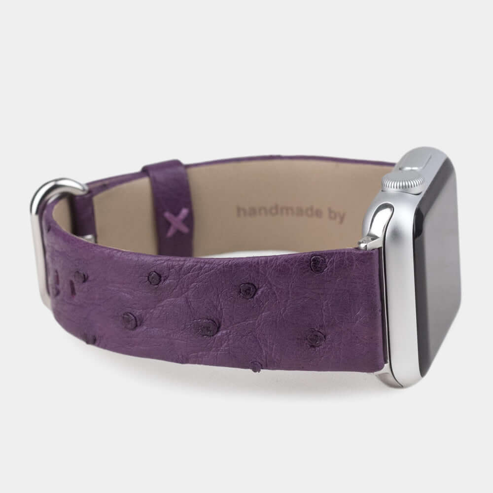 Strap for the Apple Watch 41/42 mm in purple ostrich leather, with steel adapters and buckle | 3/4 profile view to see the inner lining leather