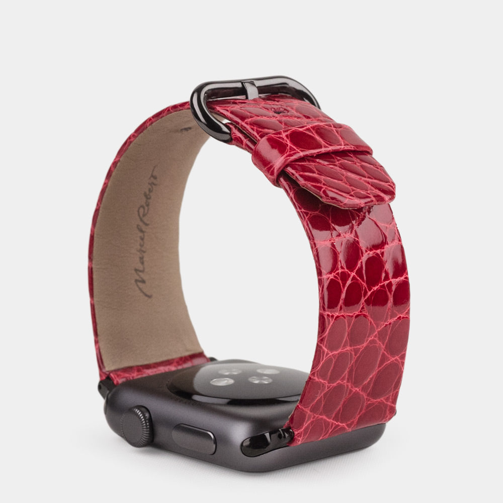 red alligator strap apple watch black adapters and buckle upper view