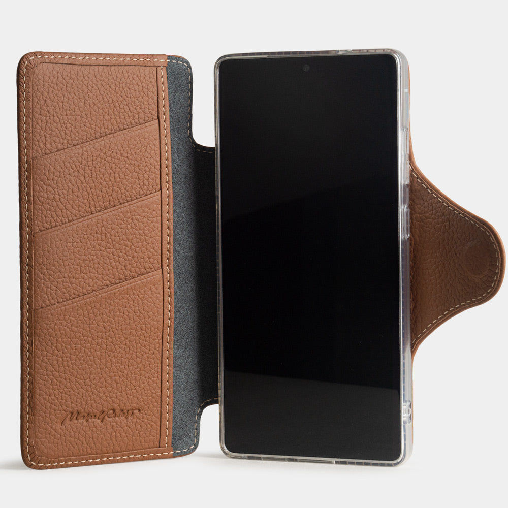 gold leather Samsung S26 Ultra wallet case opened showing interior card holder slots