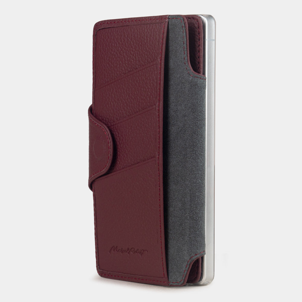 bordeaux leather Samsung S26 Ultra flip case with magnetic closure, cover folded to the back of the smartphone revealing the interior