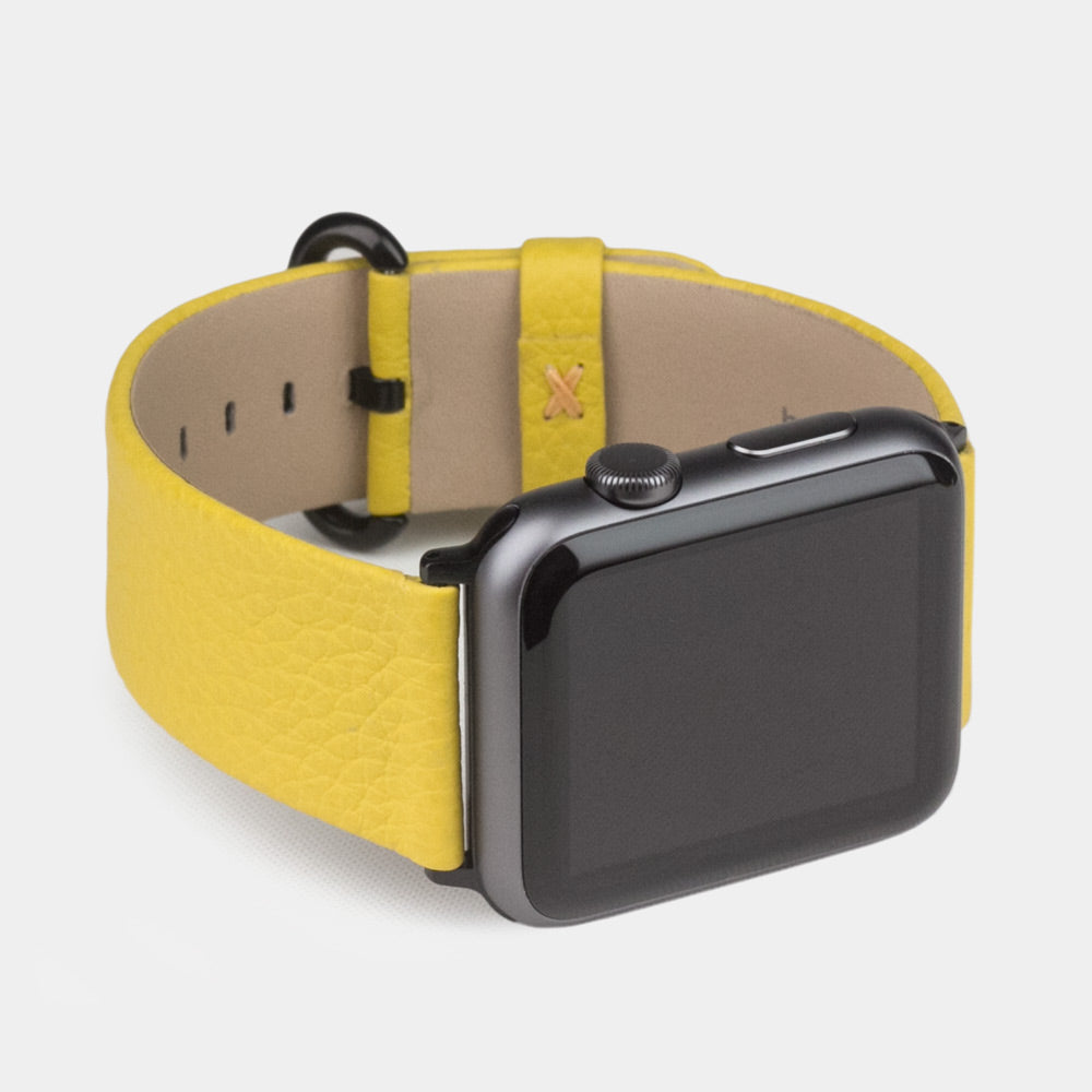 Strap for the Apple Watch 41/42 mm in yellow soft grained calfskin leather, with black adapters and buckle | profile view to better see the leather grain