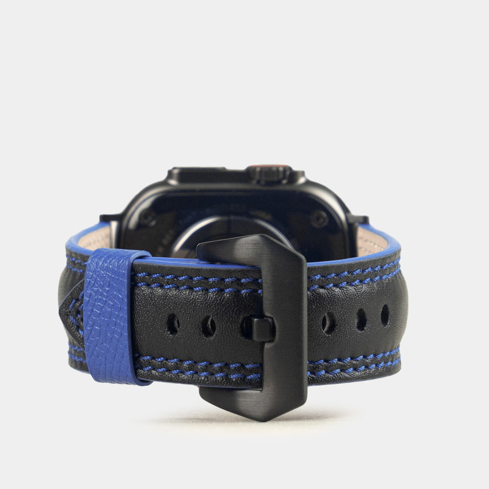 Men's Apple Watch Ultra band 49mm in black smooth calfskin leather with blue edge finish and its black color adapters - main view