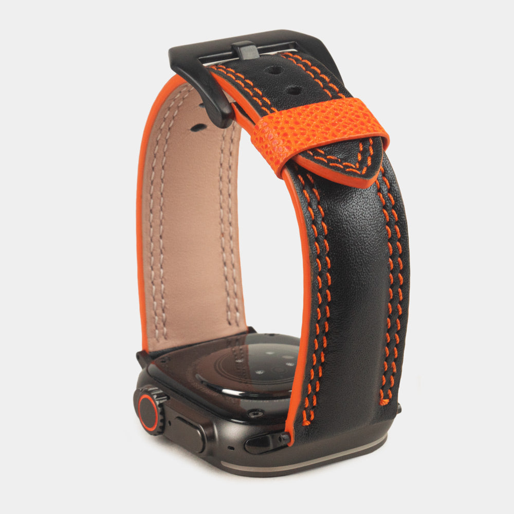 Men's Apple Watch Ultra band 49mm in black smooth calfskin leather with orange edge finish and its black color adapters - inside lining leather view