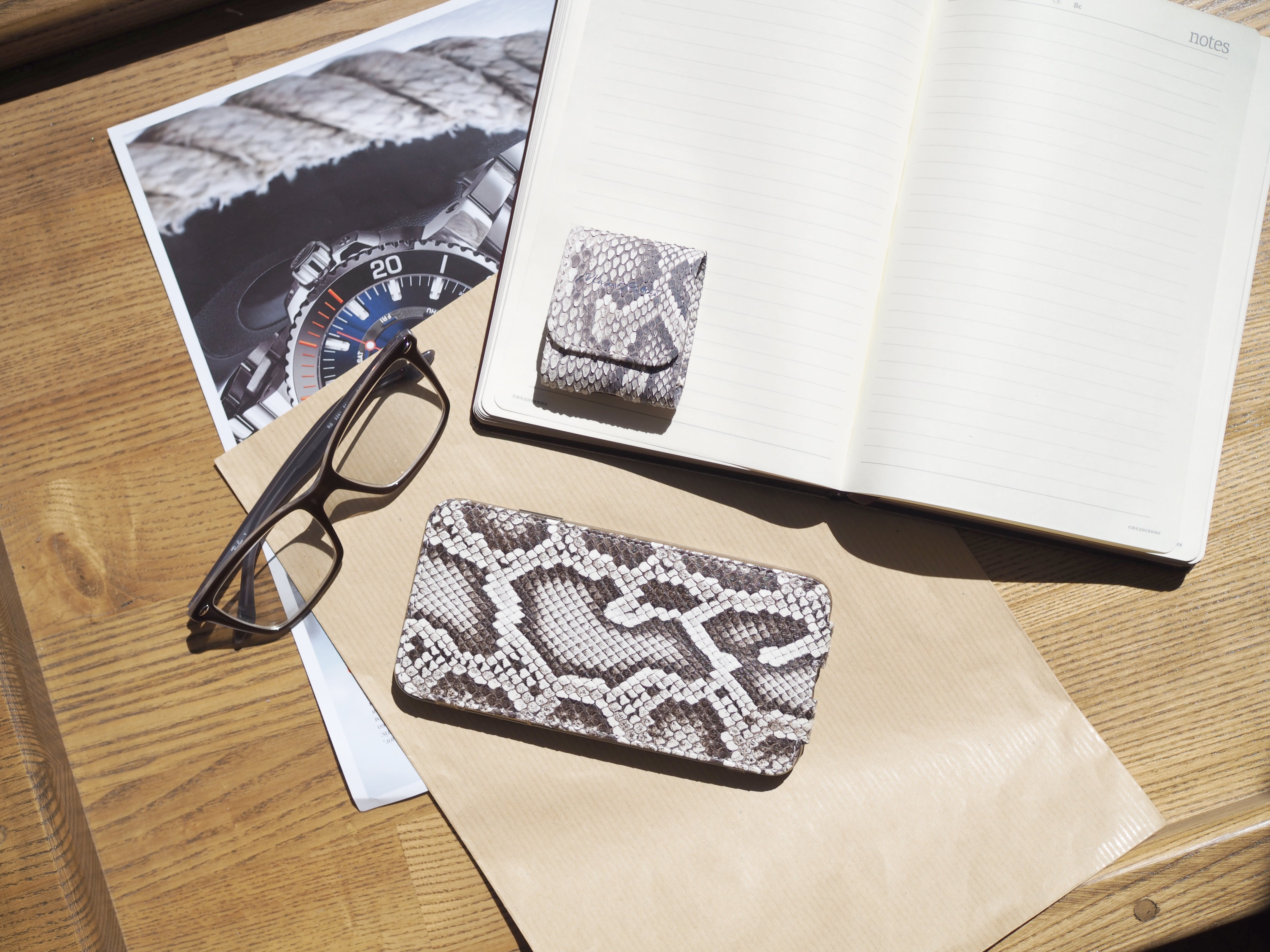 Natural python iPhone 14 Pro Max case, in hand